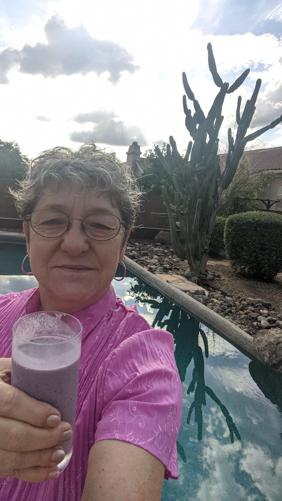 Cheers, breakfast by the pool. Nourishing my body with a healthy shake to kick-start my day.